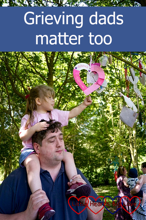 Hubby with Sophie on his shoulders, hanging a heart in a tree for Jessica - "Grieving dads matter too"
