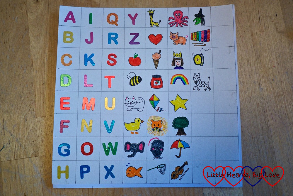 The letter stickers and pictures drawn on the grid