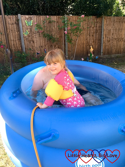 Sophie and hubby in the birthing pool in the garden