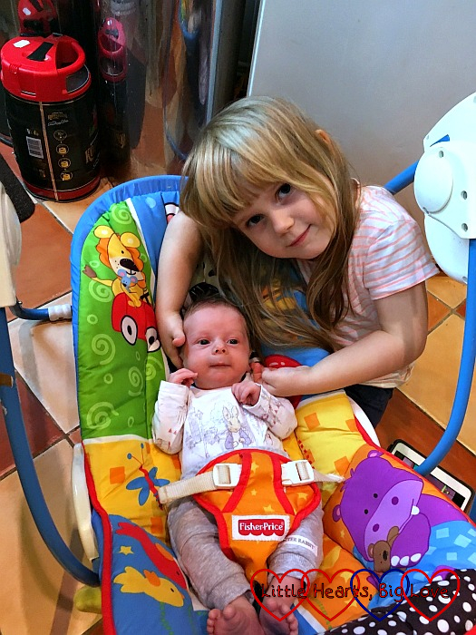 Sophie with Thomas in the swing