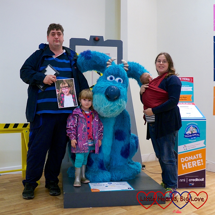 Me, hubby, Sophie and Thomas with a picture of Jessica at "Gromit P. Sullivan (Sulley)"