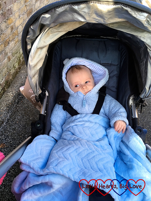 Thomas wrapped up warm in his buggy