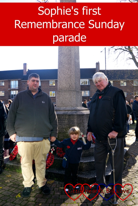 Sophie with Daddy and Grandad at the Peace Memorial