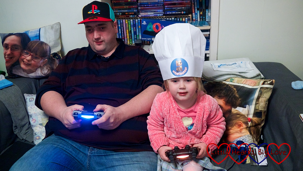 Hubby and Sophie playing on the PlayStation