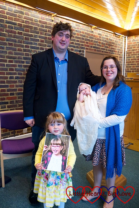 Hubby with me holding Thomas and Sophie holding Jessica's picture