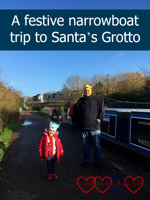 Sophie and hubby on the towpath next to a narrowboat - "A festive narrowboat trip to Santa's Grotto"