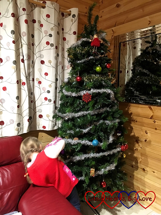 Sophie decorating the tree