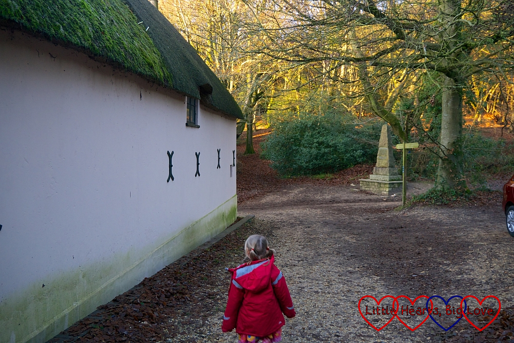 Sophie walking down the lane next to Hardy's Cottage towards the memorial