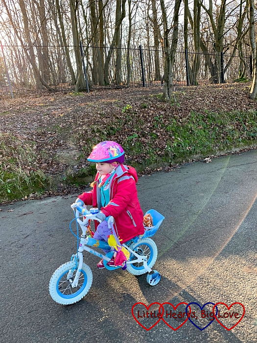 Sophie riding her bike at Ruislip Lido