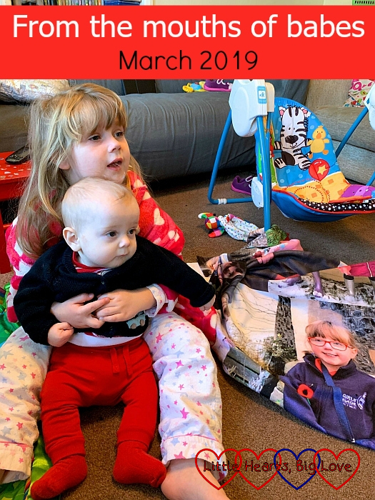 Sophie sitting and holding Thomas with Jessica's photo blanket next to them - "From the mouths of babes - March 2019"