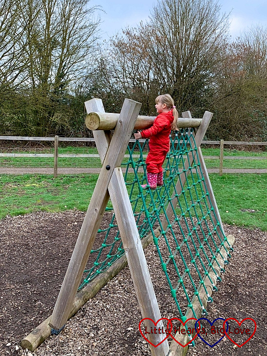 Sophie at the top of the climbing frame