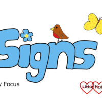 The word 'signs' with a forget-me-not over the 'I', a little robin, butterfly and dragonfly