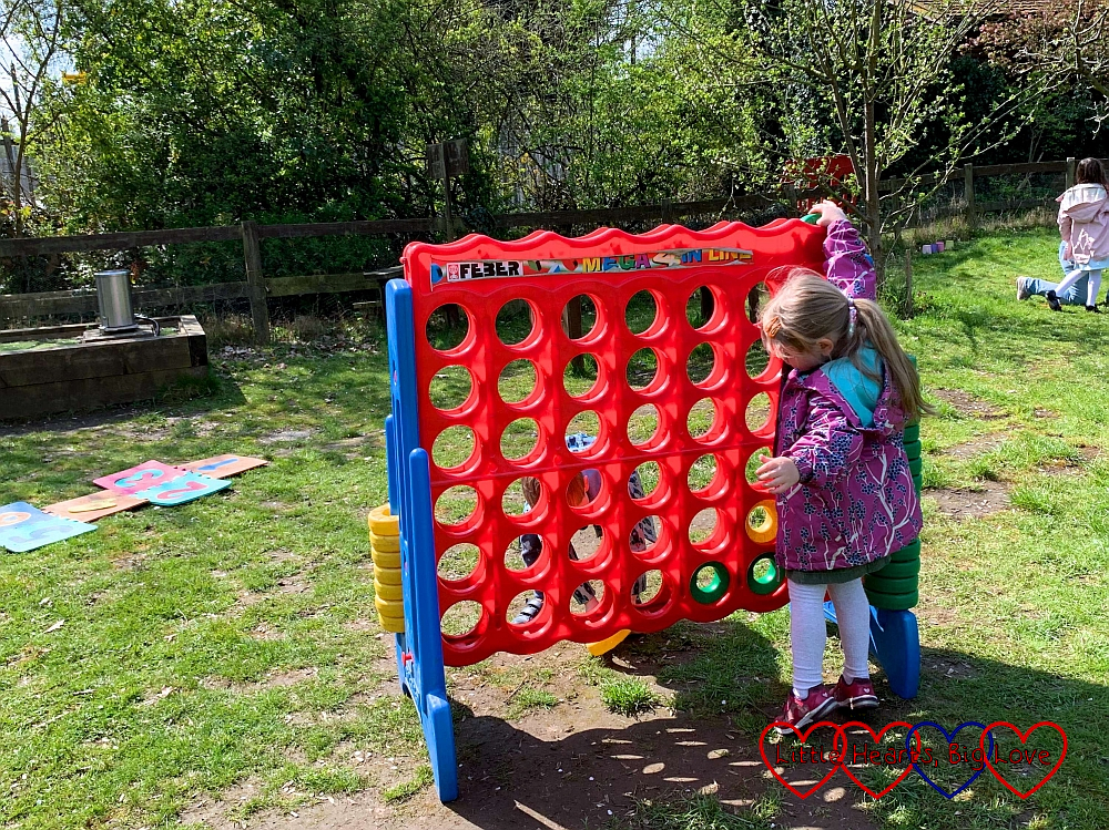 Sophie playing Connect 4 with F