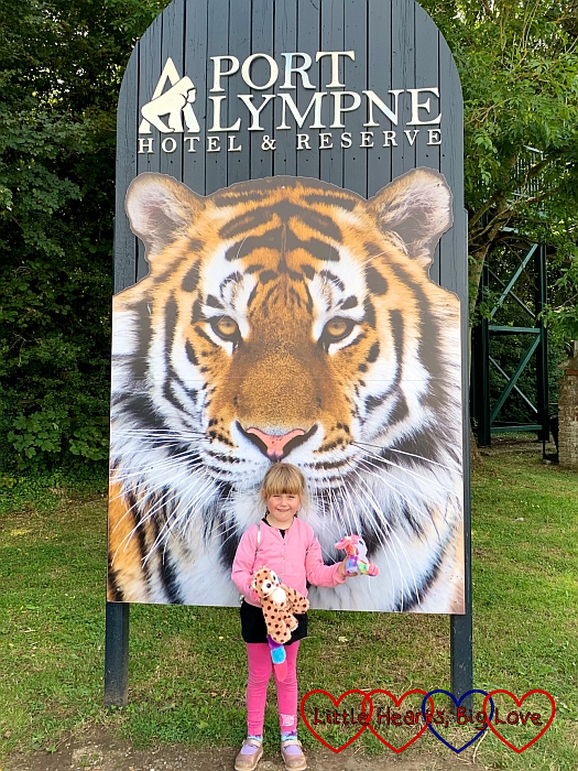 Sophie standing in front of the Port Lympne entrance sign