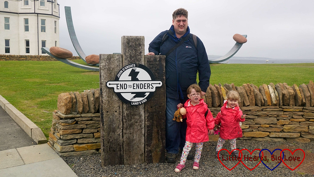 Hubby with Jessica and Sophie at the End to Enders sign at John O'Groats