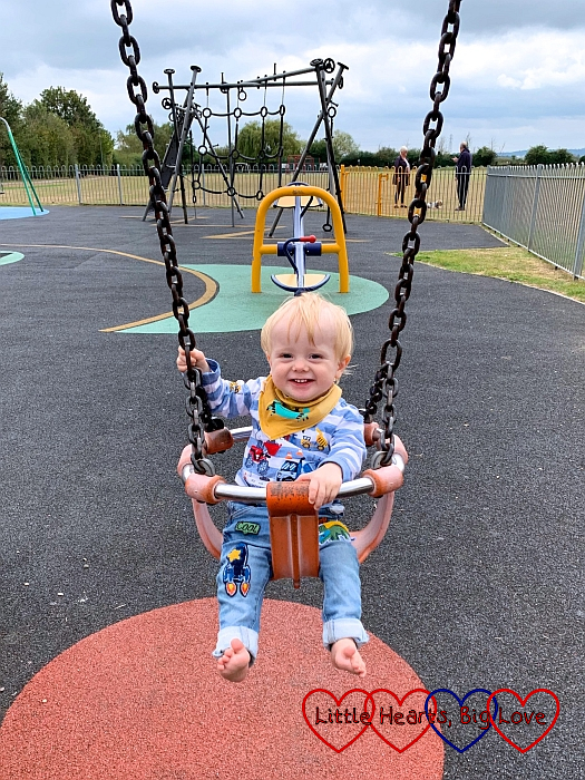 Thomas on the swing at the park