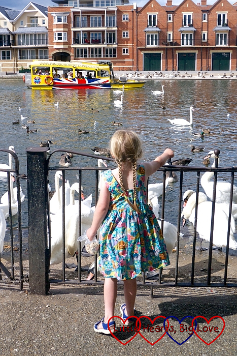 Sophie watching the 'Duck bus' sailing past on the River Thames