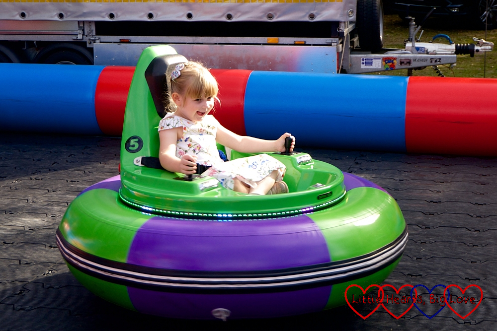 Sophie on an inflatable bumper car