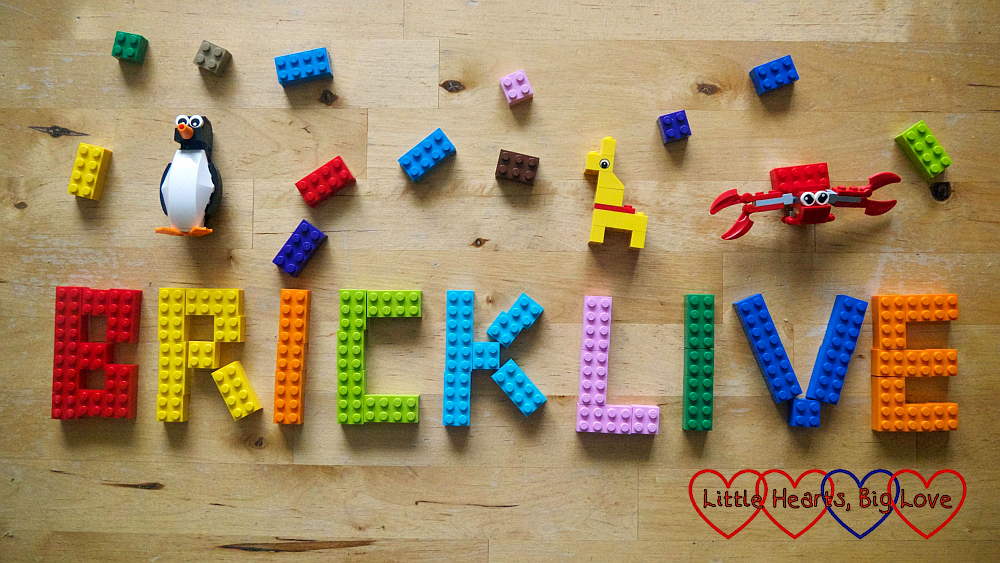 The word 'BRICKLIVE' created using colourful LEGO bricks surrounded by brick figures and small bricks