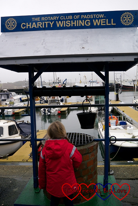 Sophie at the charity wishing well at Padstow