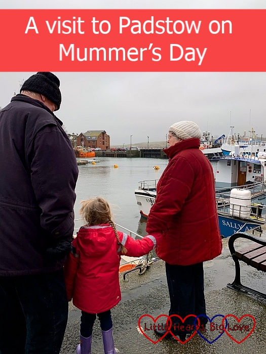 Grandad, Sophie and Grandma looking at the boats in Padstow - "A visit to Padstow on Mummer's Day"