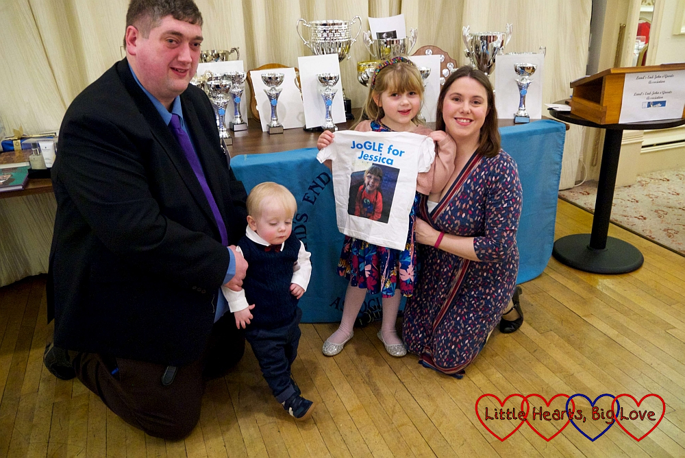 Hubby, Thomas, Sophie (holding her JoGLE for Jessica T-shirt) and me in front of the trophy table at the Land's End - John O'Groats Annual Dinner