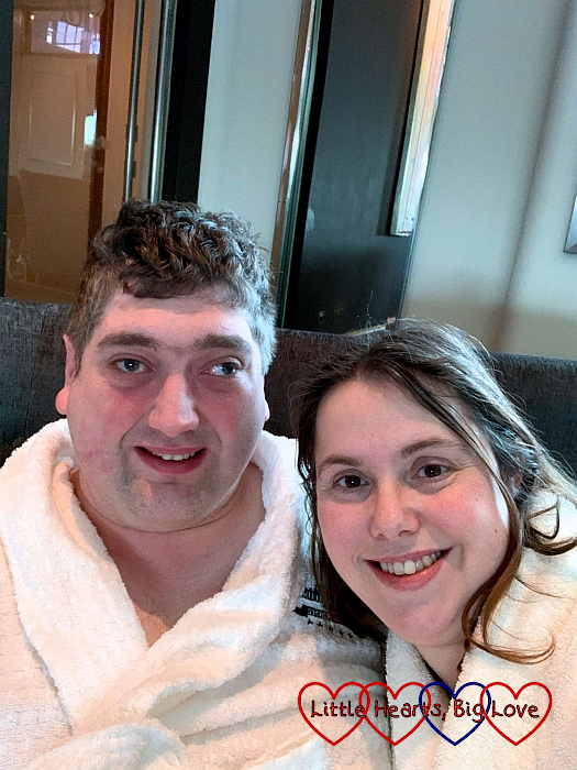 Me and hubby in bathrobes at a spa day