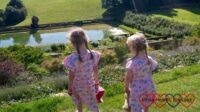 Sophie and Jessica looking down at the mirror pool at Upton House