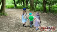 Sophie, Thomas and Jessica walking in front of me holding hands