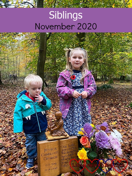 Sophie and Thomas with the carving of Jessica at Jessica's forever bed - "Siblings - November 2020"