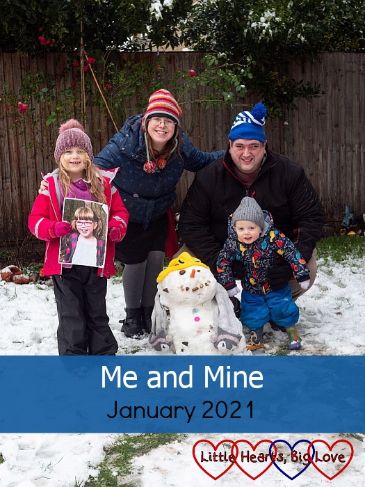 Sophie (holding a photo of Jessica), me, hubby and Thomas out in the garden in the snow with Sophie's snowman in front of us - "Me and Mine - January 2021"