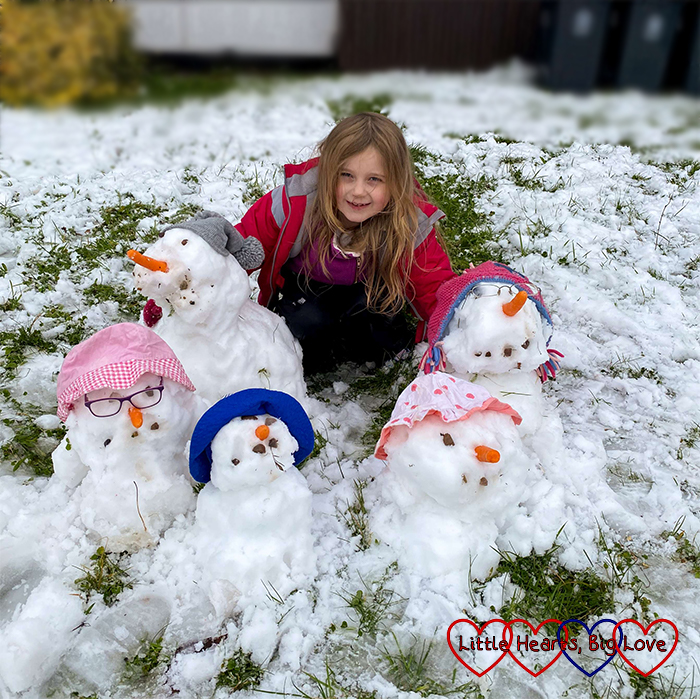 Sophie with her snow family