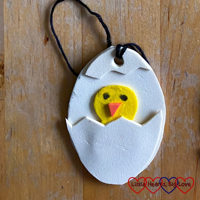 A craft foam Easter egg decoration of a chick inside a shell