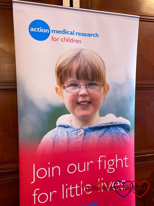 Jessica's photo on an Action Medical Research banner with the words "Join our fight for little lives"