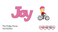 The word 'joy' in pink with a drawing of Sophie riding her bike