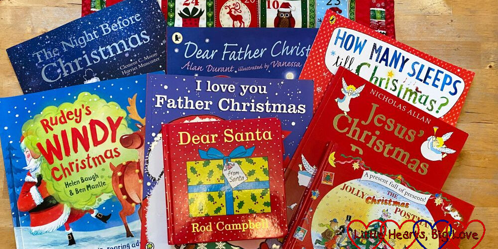 A selection of Christmas books on a table