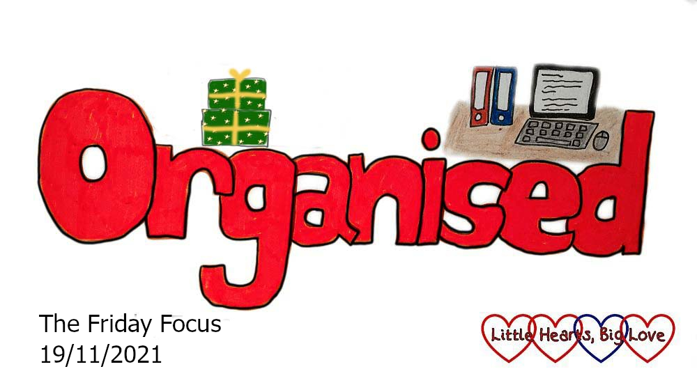 The word 'organised' in red with a doodle of wrapped Christmas presents above the 'rg' and a doodle of my computer desk with a computer and box files above the 'se'