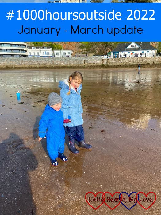 Sophie and Thomas in winter clothes and wellies paddling in the sea on Torquay beach - "#1000hoursoutside 2022: January–March update"