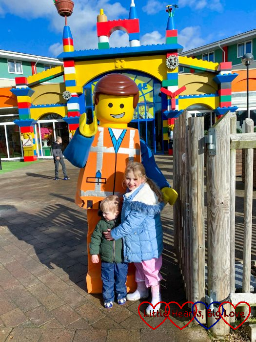Sophie and Thomas with a giant Lego figure at Legoland
