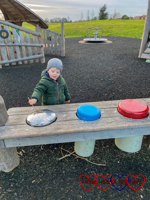 Thomas with a steel drum in the park