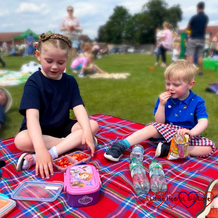 Sophie and Thomas enjoying a community picnic for the Platinum Jubilee