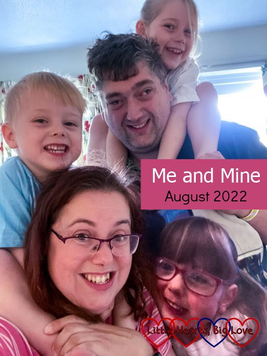Sophie on Daddy's shoulders and Thomas on my shoulders with Daddy holding Jessica's photo cushion - "Me and Mine - August 2022"