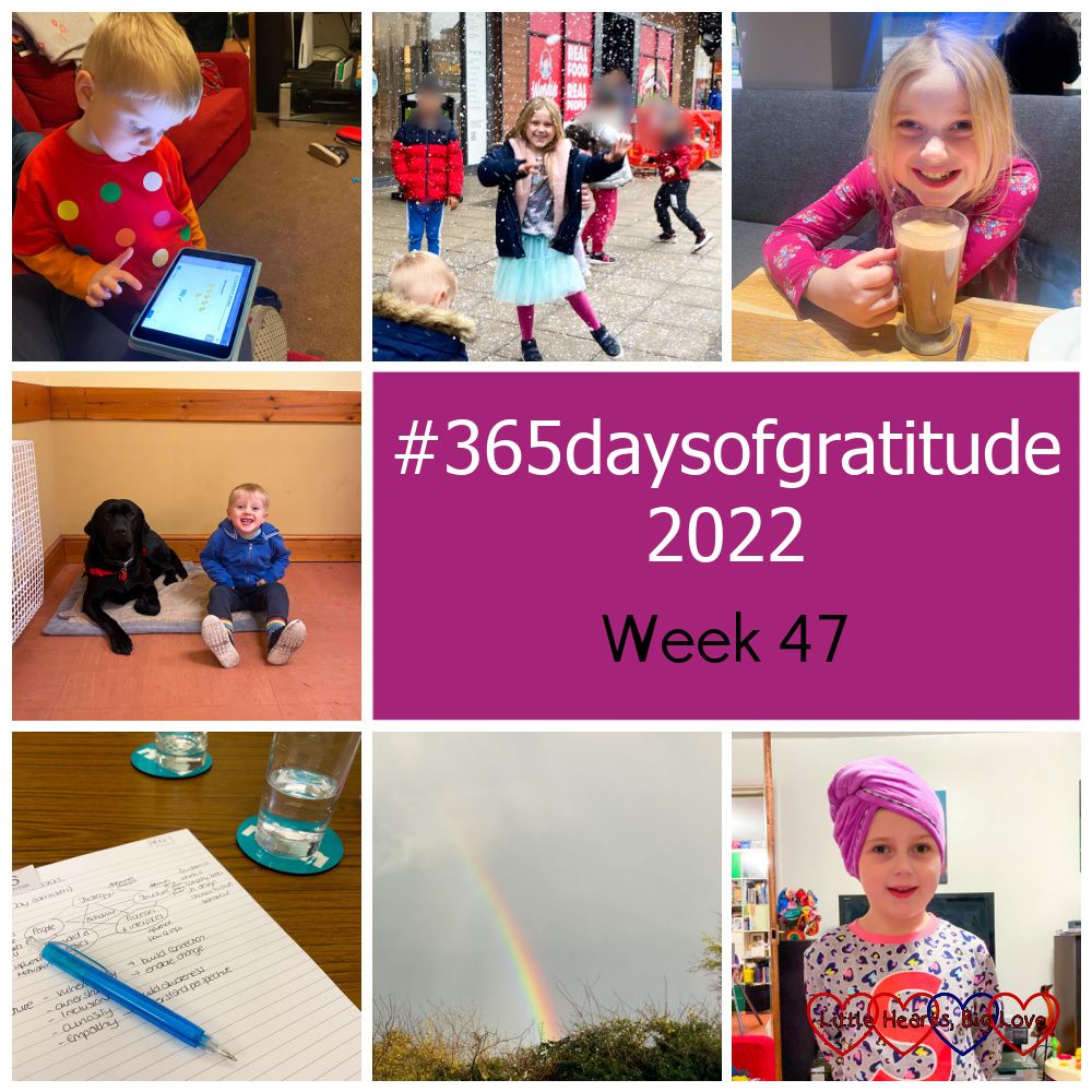 Thomas playing Mathletics on the iPad; Sophie dancing in fake snow in town; Sophie drinking hot chocolate in Costa; Thomas with a black labrador; my notes from an HR meeting; a rainbow in a cloudy sky; Sophie with her hair wrapped in a turban towel - "#365daysofgratitude 2022 - Week 47"