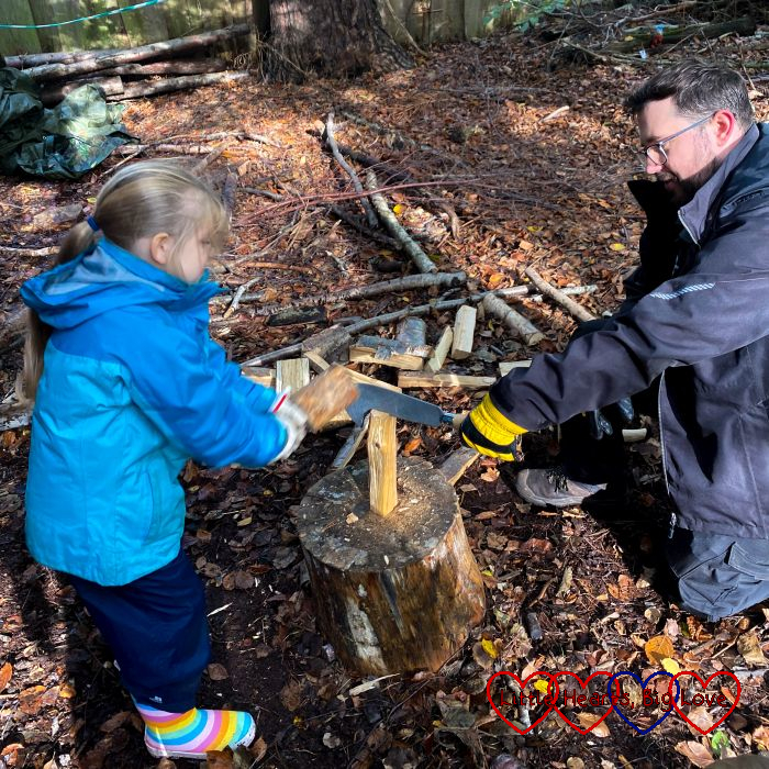 Sophie chopping wood at Kids Go Wild