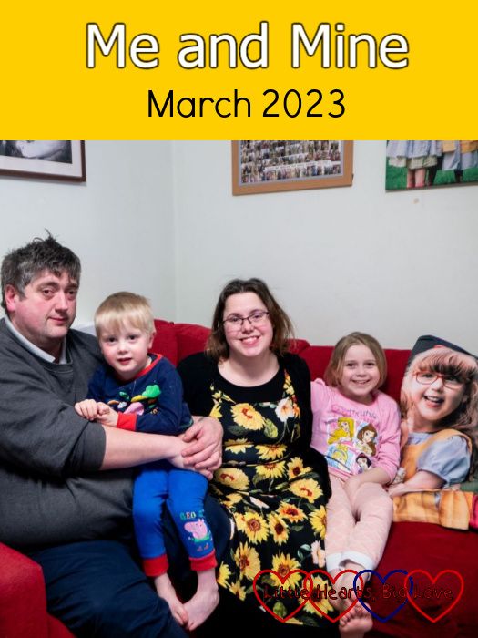 My husband, Thomas, Sophie and me sitting on the Sophie next to Jessica's photo blanket - "Me and Mine - March 2023"