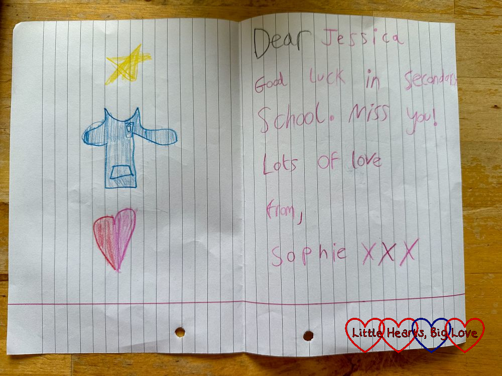 Sophie's leaver's card to Jessica with pictures of a star, leaver's hoody and a heart. The text reads "Dear Jessica. Good luck in secondary school. Miss you. Love from Sophie xxx"