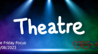 The word 'theatre' in white letters against a image of an empty stage with lights