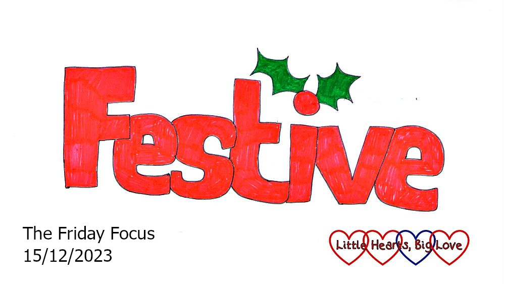 The word 'festive' in red, with holly leaves around the dot over the i