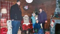 Me (holding Jessica's photo), my husband, Sophie and Thomas with Father Christmas at Chessington World of Adventures